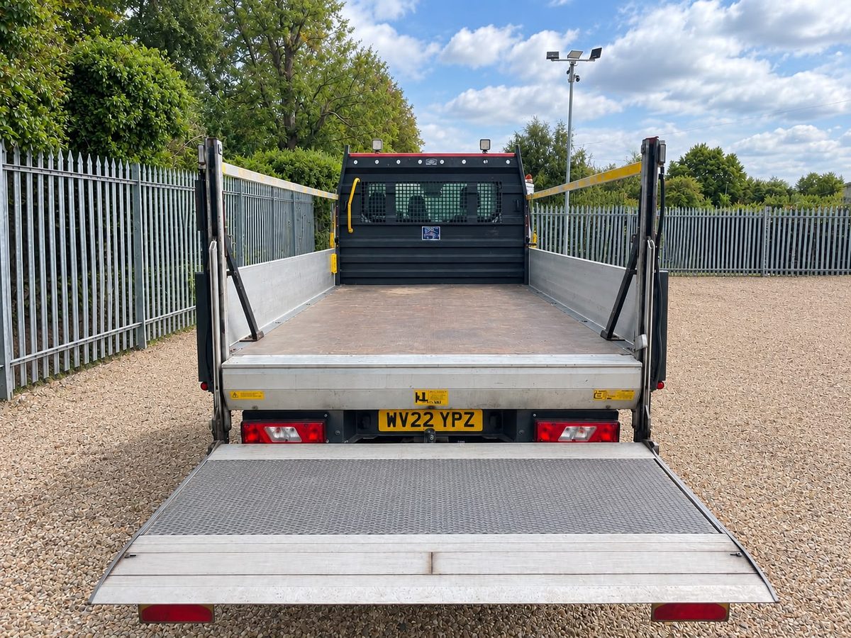 Dropside load bed and tail lift